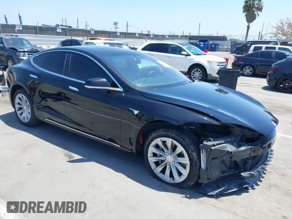 2017 Tesla Model S 60 with VIN 5YJSA1E17HF232699, listed as a IAAI auction lot 42327539 with 113,923 mi miles and . Bid and sale history available at DreamBid. Image 1.