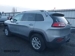 2014 Jeep Cherokee Latitude with VIN 1C4PJMCSXEW220556, listed as a IAAI auction lot 41060501 with 70,152 mi miles and . Bid and sale history available at carsss.com. Image 3.