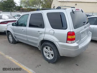 2005 Ford Escape Hybrid with VIN 1FMCU95H05KC95225, listed as a IAAI auction lot 41798610 with 216,659 mi miles. Bid and sale history available at carsss.com. Image 3.