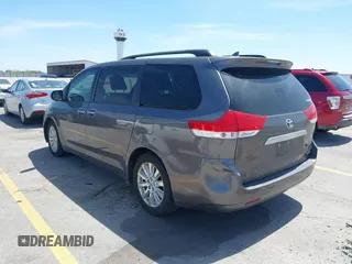 2012 Toyota Sienna XLE AAS with VIN 5TDYK3DCXCS251984, listed as a IAAI auction lot 42235046 with 126,404 mi miles and . Bid and sale history available at DreamBid. Image 3.