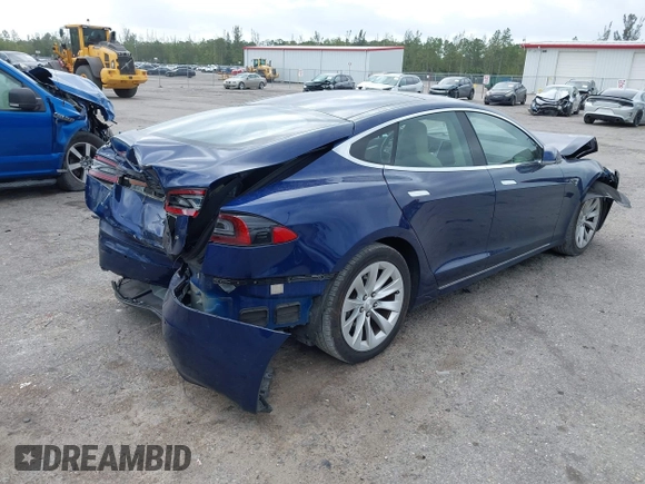 2016 Tesla Model S 70 with VIN 5YJSA1E10GF141725, listed as a IAAI auction lot 41878171 with 119,025 mi miles and . Bid and sale history available at DreamBid. Image 4.