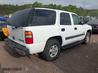 2003 Chevrolet Tahoe LT with VIN 1GNEC13Z13J230763, listed as a IAAI auction lot 42028002 with 201,448 mi miles. Bid and sale history available at carsss.com. Image 4.