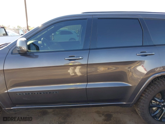 2021 Jeep Grand Cherokee Laredo X with VIN 1C4RJEAG2MC785610, listed as a IAAI auction lot 40578955 with 58,213 mi miles. Bid and sale history available at carsss.com. Image 14.