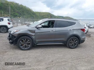 2017 Hyundai Santa Fe Ultimate z VIN 5XYZWDLA4HG441962, wystawiony jako IAAI lot #42144550 z przebiegiem 124 627 mil mil oraz . Historia ofert i sprzedaży dostępna na DreamBid. Obrazek 14.