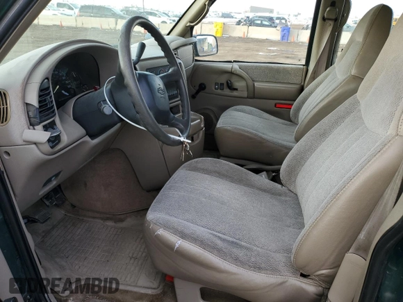 1999 Chevrolet Astro with VIN 1GNEL19W8XB101139, listed as a Copart auction lot 45427415 with 140,850 mi miles and Salvage Title. Bid and sale history available at carsss.com. Image 7.