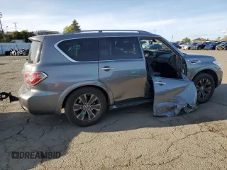 2017 Nissan Armada Platinum z VIN JN8AY2NF1H9300454, wystawiony jako Copart lot #49198605 z przebiegiem 109 546 mil mil oraz Szkoda całkowita • Salvage title. Historia ofert i sprzedaży dostępna na DreamBid. Obrazek 3.