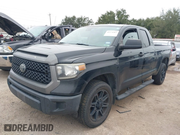 2019 Toyota Tundra SR with VIN 5TFRM5F1XKX143105, listed as a IAAI auction lot 41274567 with 180,602 mi miles and . Bid and sale history available at DreamBid. Image 2.