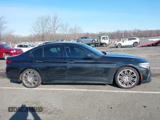 2018 BMW 5 Series M550i xDrive with VIN WBAJB9C55JB049529, listed as a IAAI auction lot 41241917 with 116,265 mi miles and . Bid and sale history available at carsss.com. Image 13.