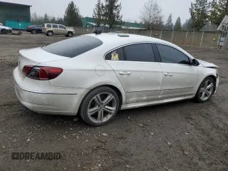 2014 Volkswagen CC Sport with VIN WVWBP7ANXEE512561, listed as a Copart auction lot 88355865 with 140,981 mi miles and Salvage Title. Bid and sale history available at carsss.com. Image 3.
