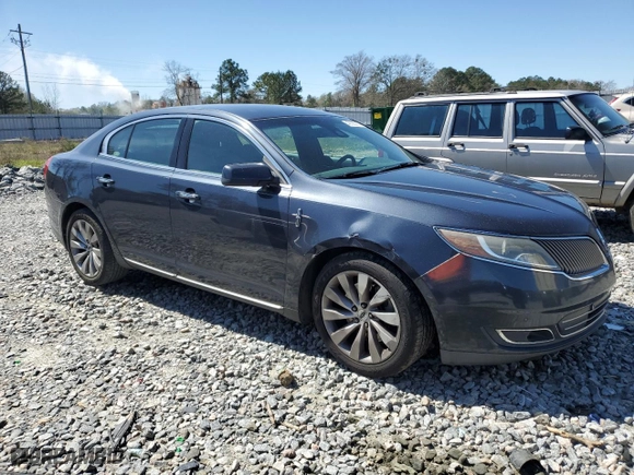 2013 Lincoln MKS with VIN 1LNHL9DK8DG617570, listed as a Copart auction lot 49063985 with 327,205 mi miles and Salvage Title. Bid and sale history available at carsss.com. Image 4.