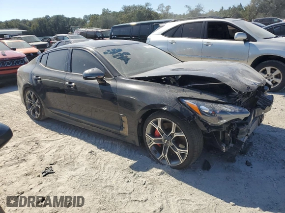 2020 Kia Stinger GT with VIN KNAE35LC8L6072093, listed as a Copart auction lot 77596574 with 77,347 mi miles and Salvage Title. Bid and sale history available at DreamBid. Image 4.