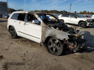 2013 Jeep Grand Cherokee Overland with VIN 1C4RJFCG5DC639401, listed as a Copart auction lot 79003094 with 0 mi miles and Salvage Title. Bid and sale history available at carsss.com. Image 4.