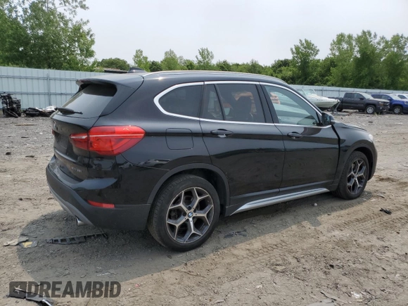 2018 BMW X1 xDrive28i with VIN WBXHT3C36J3H29952, listed as a Copart auction lot 59679285 with 75,220 mi miles and Salvage title. Bid and sale history available at DreamBid. Image 3.