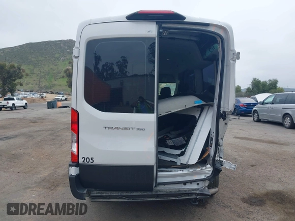 2023 Ford Transit Passenger XL с VIN 1FDAX2C80PKA74557, выставлен на аукционе IAAI как лот 41864316 с пробегом 50 640 миль миль и . История ставок и продаж доступна на DreamBid. Изображение 16.