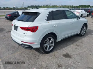 2022 Audi Q3 S line Premium Plus with VIN WA1EECF32N1065423, listed as a IAAI auction lot 42081354 with 27,071 mi miles and . Bid and sale history available at DreamBid. Image 4.