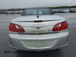 2010 Chrysler Sebring Touring z VIN 1C3BC5ED1AN153410, wystawiony jako Copart lot #55224685 z przebiegiem Nie podano mil oraz Szkody całkowita. Historia ofert i sprzedaży dostępna na DreamBid. Obrazek 6.