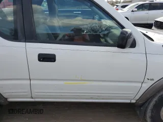 2001 Isuzu Rodeo z VIN 4S2CK57W614340766, wystawiony jako Copart lot #73891524 z przebiegiem 124 446 mil mil oraz Nie do naprawy. Historia ofert i sprzedaży dostępna na DreamBid. Obrazek 12.