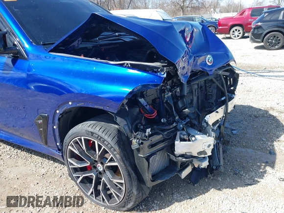2022 BMW X5 M z VIN 5YMJU0C00N9M64484, wystawiony jako IAAI lot #41825141 z przebiegiem Nie podano mil oraz . Historia ofert i sprzedaży dostępna na DreamBid. Obrazek 13.