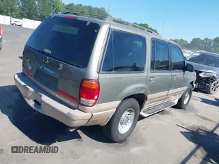 2001 Mercury Mountaineer with VIN 4M2ZU86P61UJ00123, listed as a IAAI auction lot 42692270 with 261,819 mi miles and . Bid and sale history available at DreamBid. Image 4.