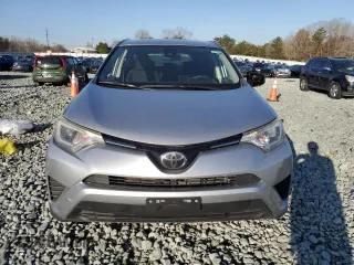 2018 Toyota RAV4 LE with VIN JTMBFREV4JD251520, listed as a Copart auction lot 48574485 with 133,079 mi miles and Salvage Title. Bid and sale history available at carsss.com. Image 5.