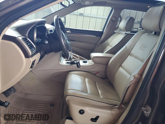 2017 Jeep Grand Cherokee Overland with VIN 1C4RJFCTXHC768687, listed as a Copart auction lot 51442495 with 123,578 mi miles and Clean Title. Bid and sale history available at carsss.com. Image 7.