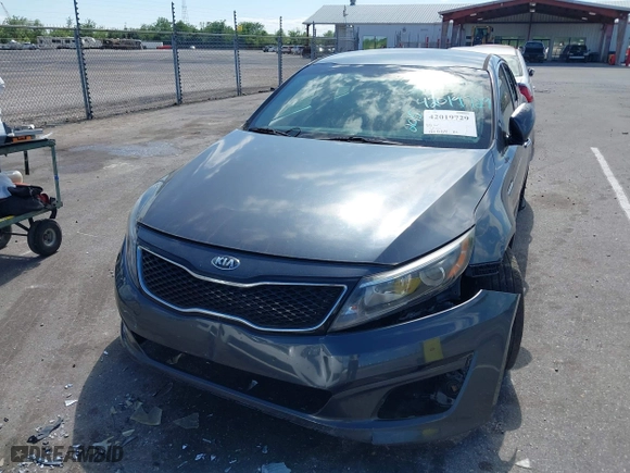 2015 Kia Optima LX with VIN KNAGM4A71F5634755, listed as a IAAI auction lot 42019729 with 101,064 mi miles. Bid and sale history available at carsss.com. Image 6.