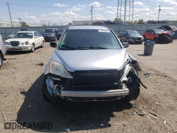 2009 Honda CR-V LX z VIN 5J6RE383X9L035529, wystawiony jako Copart lot #57875445 z przebiegiem 122 651 mil mil oraz Szkoda całkowita • Salvage title. Historia ofert i sprzedaży dostępna na DreamBid. Obrazek 5.