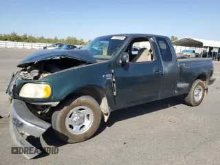 2001 Ford F-150 XL with VIN 2FTRX07L01CA13134, listed as a Copart auction lot 73090084 with 272,979 mi miles and Salvage Title. Bid and sale history available at carsss.com. Image 1.