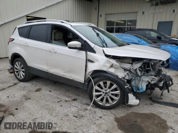 2017 Ford Escape Titanium with VIN 1FMCU0JD1HUE66040, listed as a Copart auction lot 43942665 with 55,484 mi miles and Salvage Title. Bid and sale history available at DreamBid. Image 4.