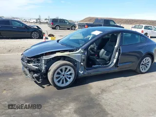 2023 Tesla Model 3 with VIN 5YJ3E1EAXPF652089, listed as a IAAI auction lot 42666520 with 17,679 mi miles and . Bid and sale history available at DreamBid. Image 6.