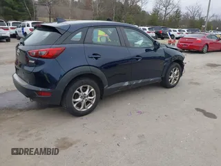 2019 Mazda CX-3 Sport with VIN JM1DKFB79K1446329, listed as a IAAI auction lot 41089506 with 90,332 mi miles. Bid and sale history available at carsss.com. Image 4.