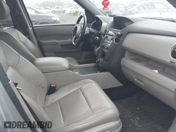 2013 Honda Pilot Touring z VIN 5FNYF4H96DB051005, wystawiony jako IAAI lot #42211189 z przebiegiem 215 594 mil mil oraz . Historia ofert i sprzedaży dostępna na DreamBid. Obrazek 5.
