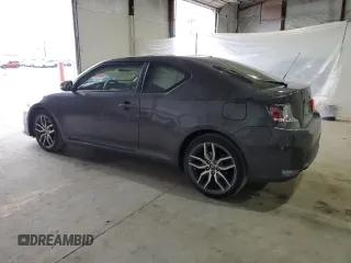 2016 Scion tC z VIN JTKJF5C75GJ022789, wystawiony jako Copart lot #54305435 z przebiegiem 49 007 mil mil oraz Szkody całkowita. Historia ofert i sprzedaży dostępna na DreamBid. Obrazek 2.