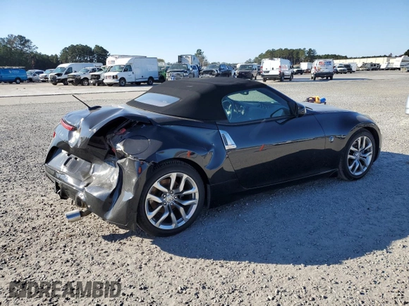 2014 Nissan 370Z Touring with VIN JN1AZ4FH3EM620195, listed as a Copart auction lot 83207104 with 66,974 mi miles and Salvage Title. Bid and sale history available at DreamBid. Image 3.