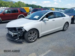 2013 Lincoln MKZ Hybrid with VIN 3LN6L2LU6DR807667, listed as a IAAI auction lot 42533419 with 90,327 mi miles and . Bid and sale history available at DreamBid. Image 2.