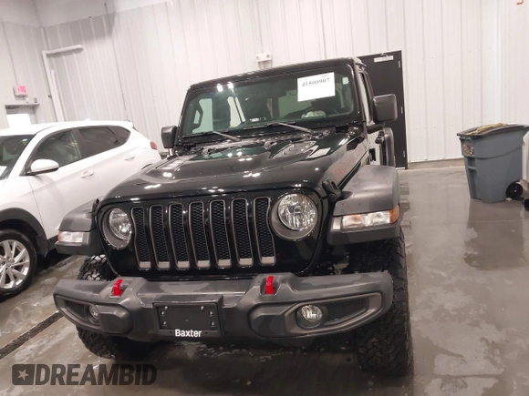 2019 Jeep Wrangler Unlimited Rubicon z VIN 1C4HJXFN7KW561193, wystawiony jako IAAI lot #41500907 z przebiegiem 18 697 mil mil oraz . Historia ofert i sprzedaży dostępna na DreamBid. Obrazek 13.