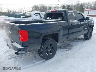 2018 Chevrolet Silverado 1500 LT with VIN 2GCVKREC6J1110953, listed as a IAAI auction lot 41352258 with 106,617 mi miles. Bid and sale history available at carsss.com. Image 4.