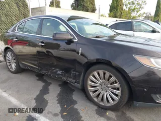 2013 Lincoln MKS with VIN 1LNHL9DK6DG608673, listed as a IAAI auction lot 42756289 with 103,118 mi miles and . Bid and sale history available at DreamBid. Image 6.