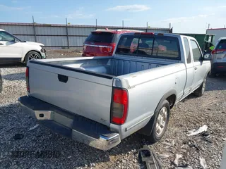 2000 Nissan Frontier XE with VIN 1N6DD26S5YC300697, listed as a IAAI auction lot 42031559 with 217,046 mi miles and . Bid and sale history available at DreamBid. Image 4.