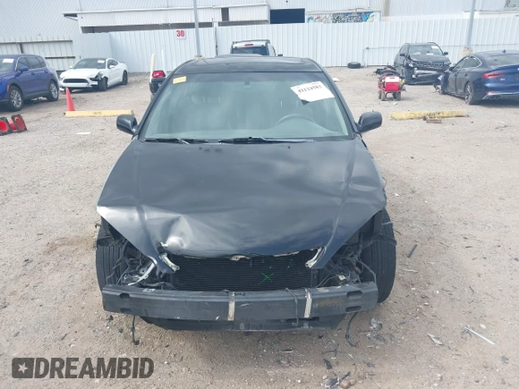 2005 Toyota Camry LE with VIN 4T1BF32K15U091945, listed as a IAAI auction lot 42124503 with 212,951 mi miles and . Bid and sale history available at DreamBid. Image 13.