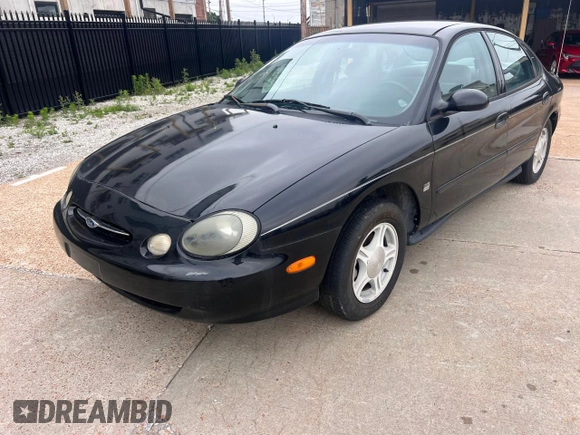 1999 Ford Taurus SE with VIN 1FAFP53SXXA145301, listed as a Copart auction lot 60351535 with 57,262 mi miles and Clean title. Bid and sale history available at DreamBid. Image 2.