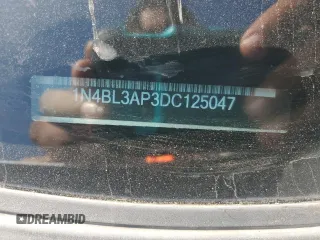 2013 Nissan Altima SL z VIN 1N4BL3AP3DC125047, wystawiony jako Copart lot #52398965 z przebiegiem 213 991 mil mil oraz Szkoda całkowita • Salvage title. Historia ofert i sprzedaży dostępna na DreamBid. Obrazek 13.
