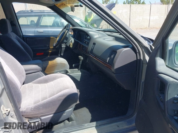 1997 Jeep Grand Cherokee Laredo with VIN 1J4GZ58S3VC603239, listed as a IAAI auction lot 42593915 with 295,696 mi miles and . Bid and sale history available at DreamBid. Image 5.
