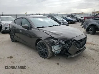 2014 Mazda 3 S Touring with VIN JM1BM1V31E1105847, listed as a Copart auction lot 50045925 with 121,538 mi miles and Salvage Title. Bid and sale history available at DreamBid. Image 4.