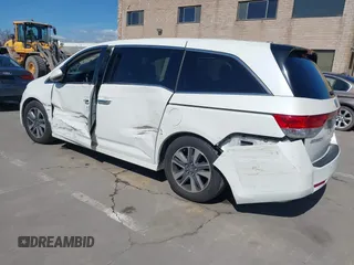 2015 Honda Odyssey Touring Elite with VIN 5FNRL5H91FB038099, listed as a IAAI auction lot 41829649 with 167,017 mi miles and . Bid and sale history available at DreamBid. Image 3.