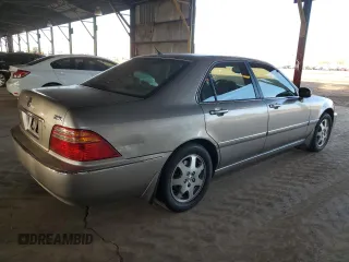 2002 Acura RL z VIN JH4KA96522C015919, wystawiony jako Copart lot #43828005 z przebiegiem 242 344 mil mil oraz Szkoda całkowita • Salvage title. Historia ofert i sprzedaży dostępna na DreamBid. Obrazek 3.