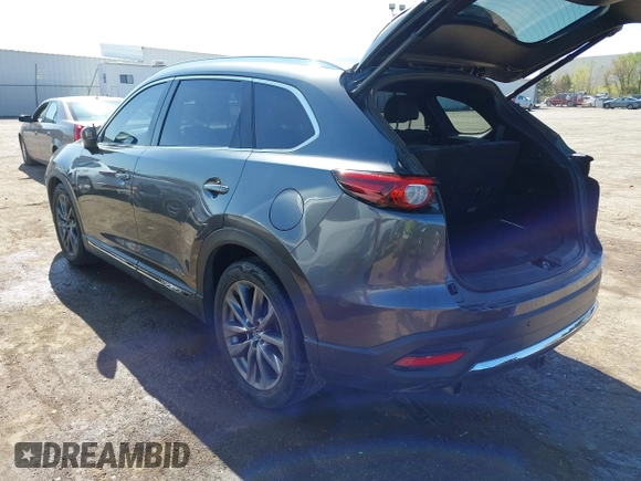 2020 Mazda CX-9 Signature with VIN JM3TCBEY9L0407955, listed as a IAAI auction lot 41984360 with 85,668 mi miles and . Bid and sale history available at carsss.com. Image 3.