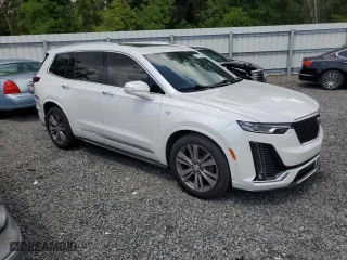 2020 Cadillac XT6 FWD Premium Luxury with VIN 1GYKPCRSXLZ183458, listed as a Copart auction lot 51249275 with 73,177 mi miles and Salvage Title. Bid and sale history available at carsss.com. Image 4.