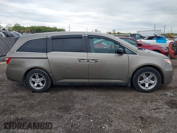 2012 Honda Odyssey EX-L with VIN 5FNRL5H68CB031930, listed as a IAAI auction lot 42222501 with 65,262 mi miles and . Bid and sale history available at DreamBid. Image 13.