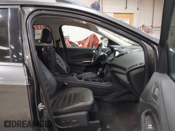2017 Ford Escape SE with VIN 1FMCU9G9XHUB71008, listed as a IAAI auction lot 40909330 with 181,480 mi miles. Bid and sale history available at carsss.com. Image 5.